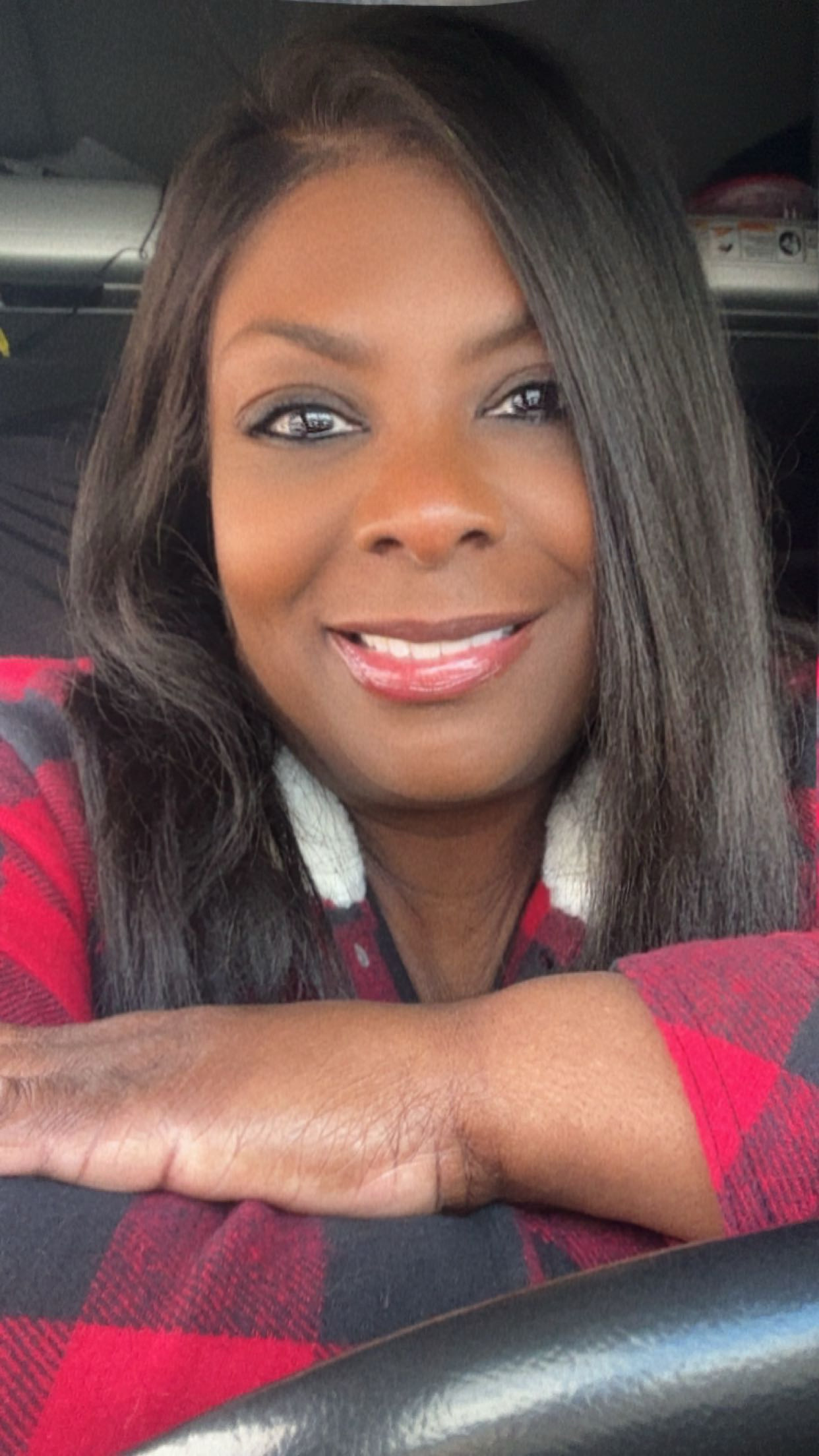Traci, founder of STARR Quality Logistics, inside a truck